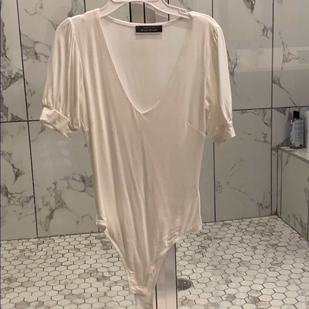 Cream short balloon sleeve body suit! Worn once!